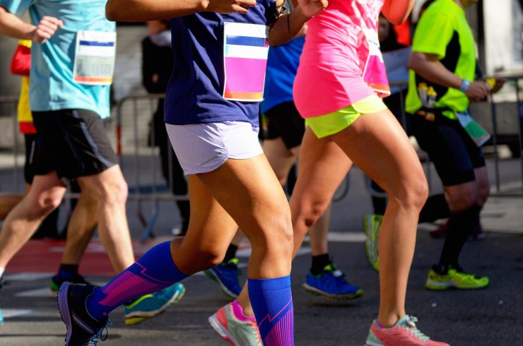 close up of runners in the marathon