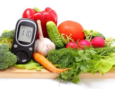 A diabetes blood glucose monitor among health vegetables
