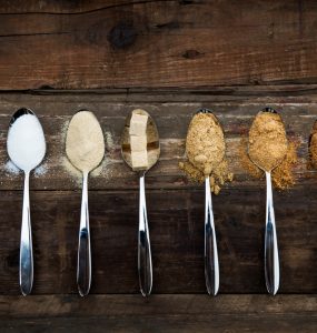 Different sugar sources on spoons