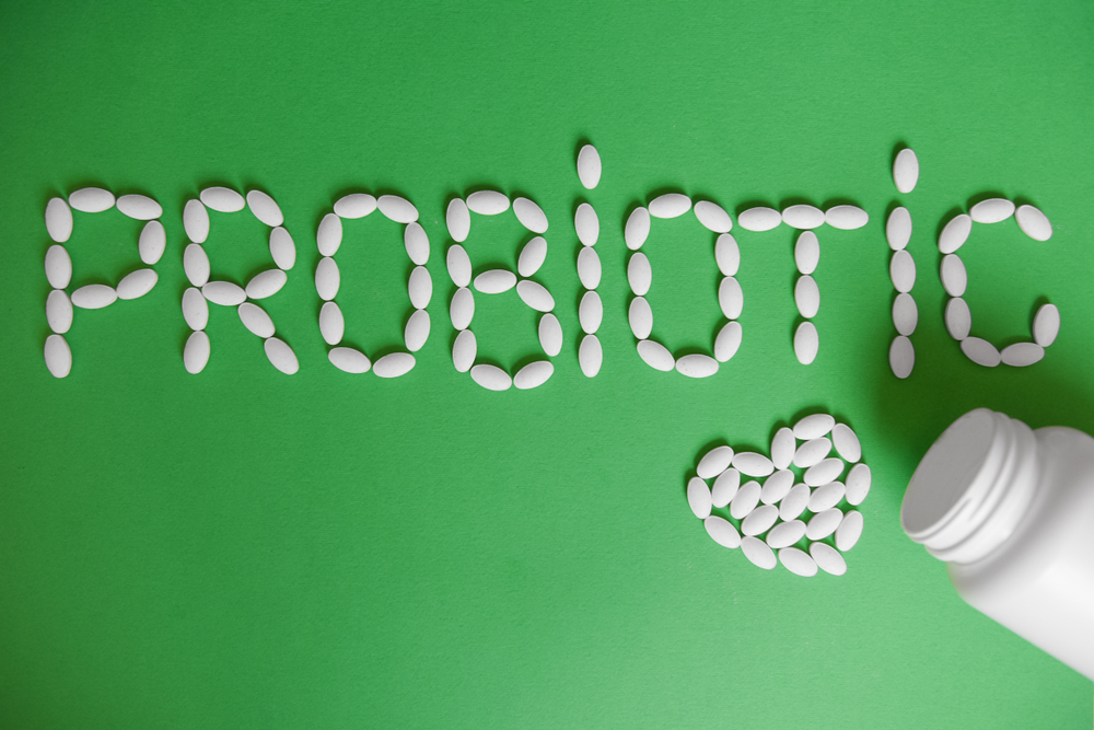 Probiotic tablets spelling out the word probiotics
