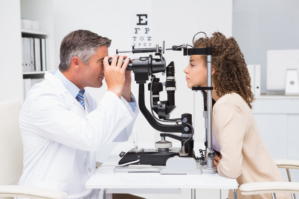 Woman having an eye test at an opticians