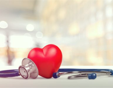 A red heart and stethoscope to represent heart health
