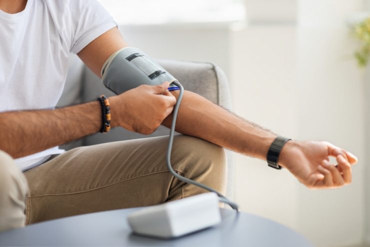 Close up of man taking blood pressure reading